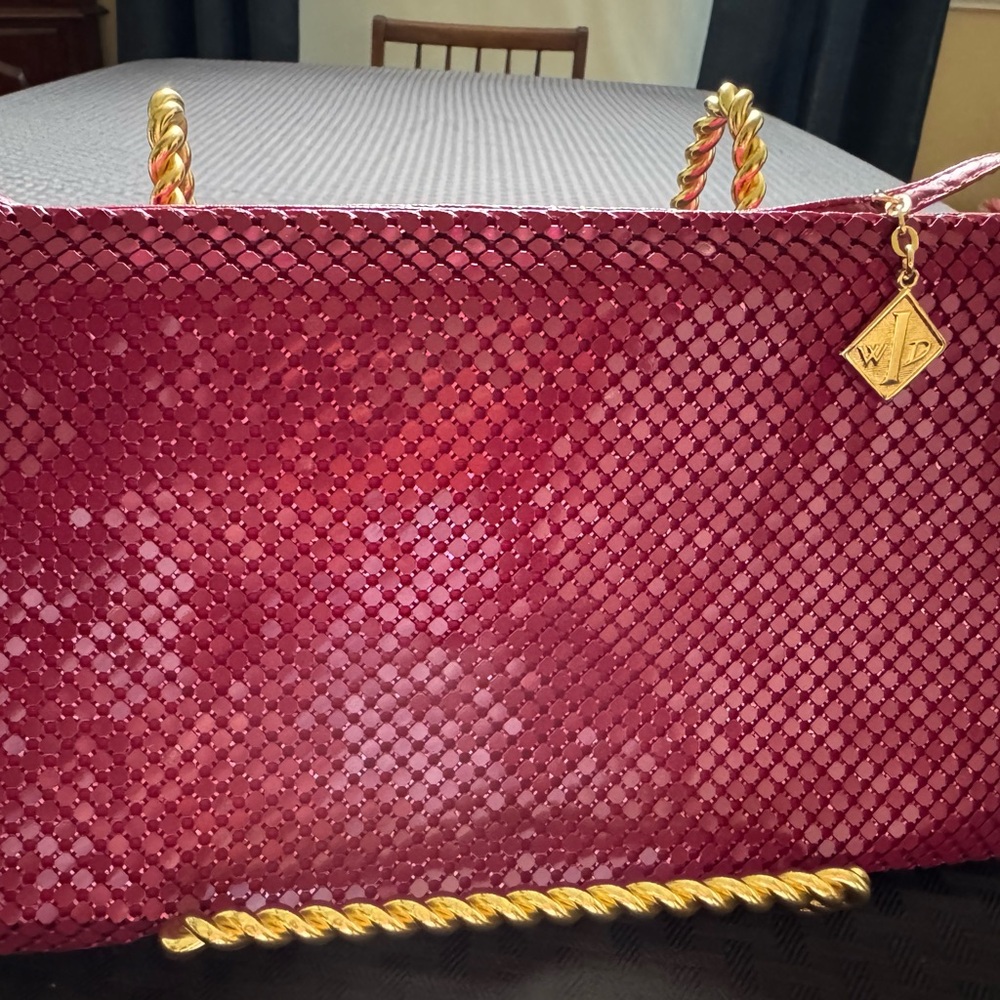 Magenta colored mesh vintage bag from White and Davis that is 10 1/2 x 6